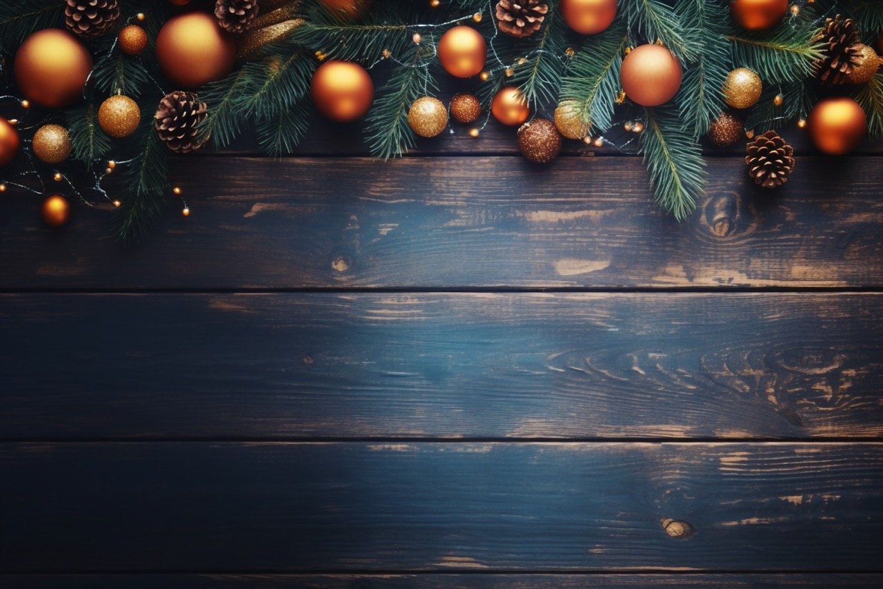 In this stock photo, explore a festive background for Christmas and New Year adorned with fir branches, Christmas baubles, and glowing lights