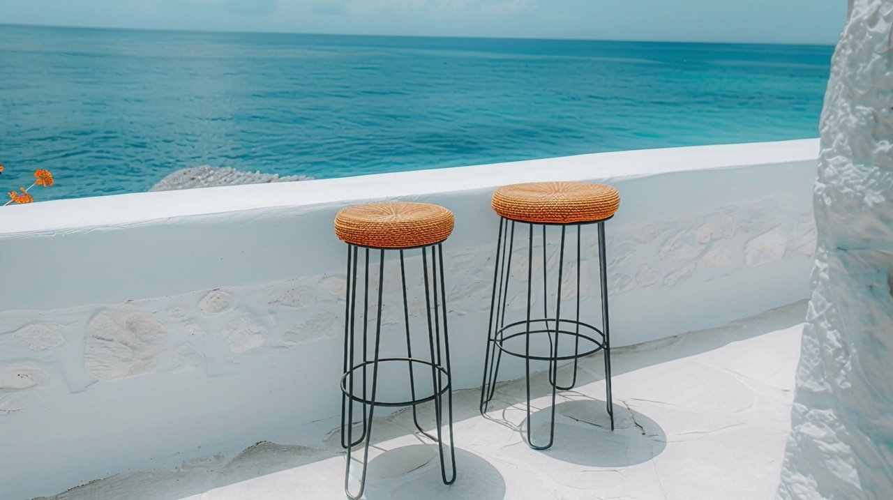 A Couple of Stools on a White Counter – Stock Photo