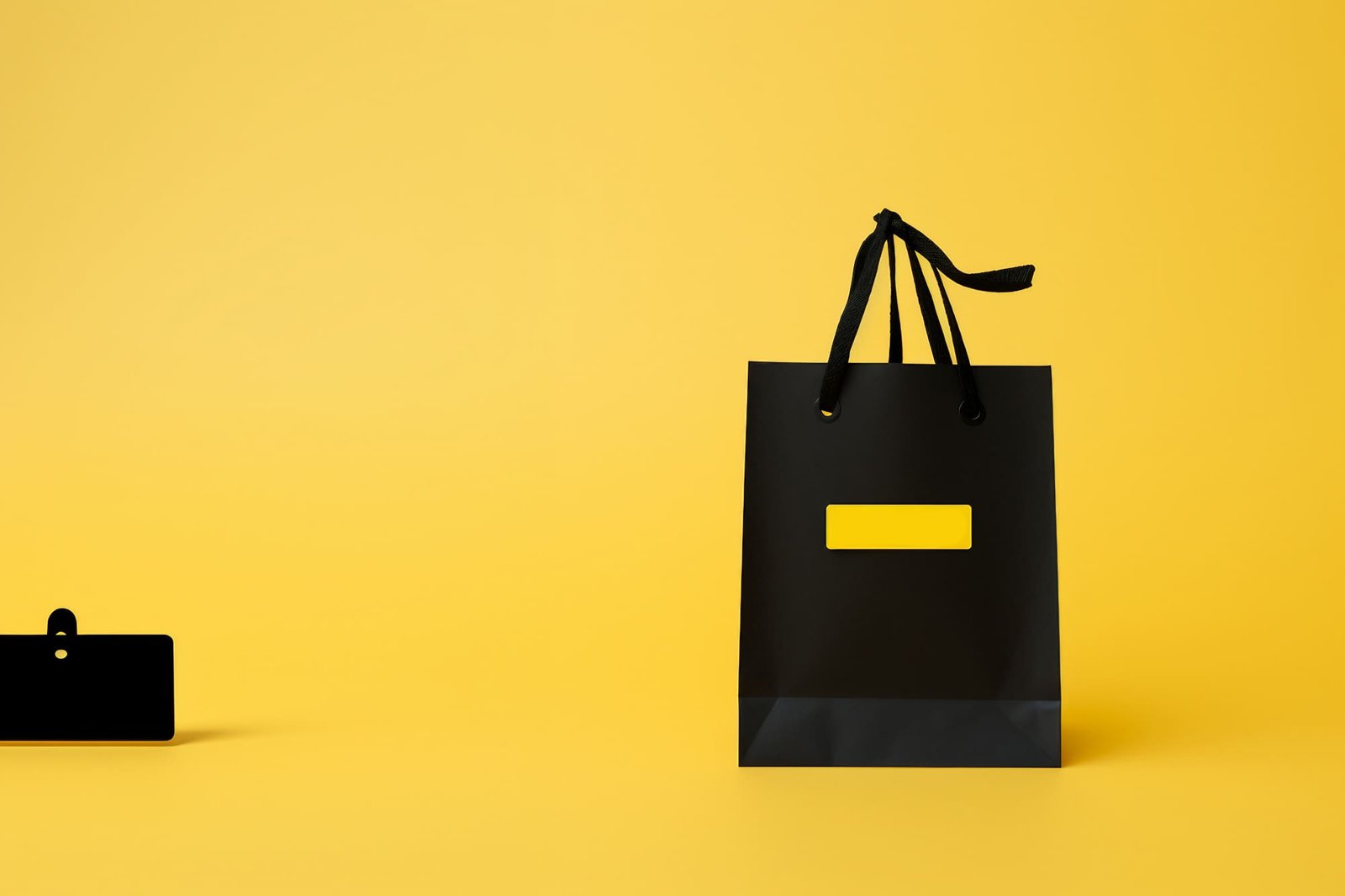 The stock photo presents a sale tag with the words ‘Black Friday’ displayed on a yellow background