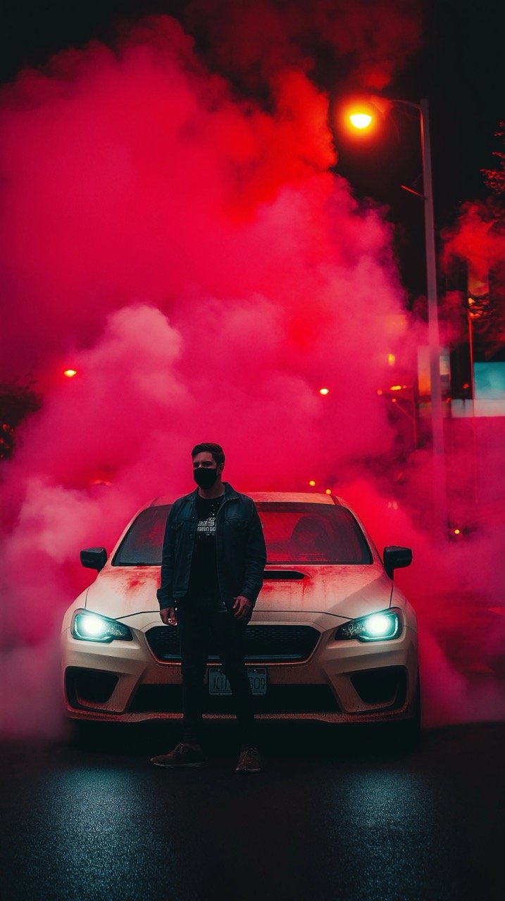 Modern Car and Unseen Man Amid Bright Dusty Cloud in City Night, Celebratory Atmosphere