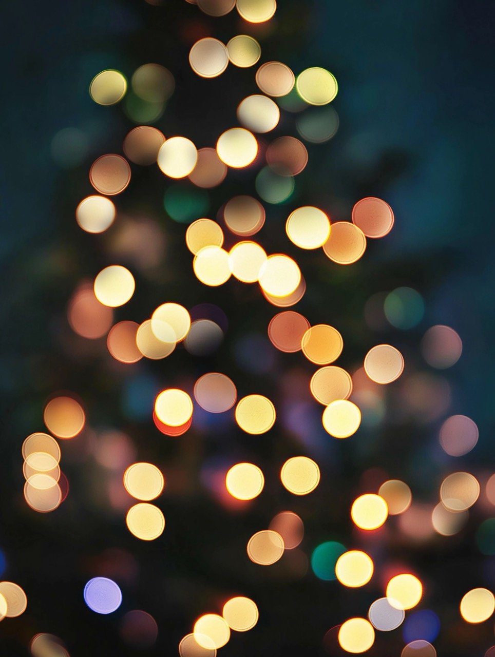 Christmas tree lights glowing brightly, illuminating the festive holiday atmosphere with colorful holiday cheer