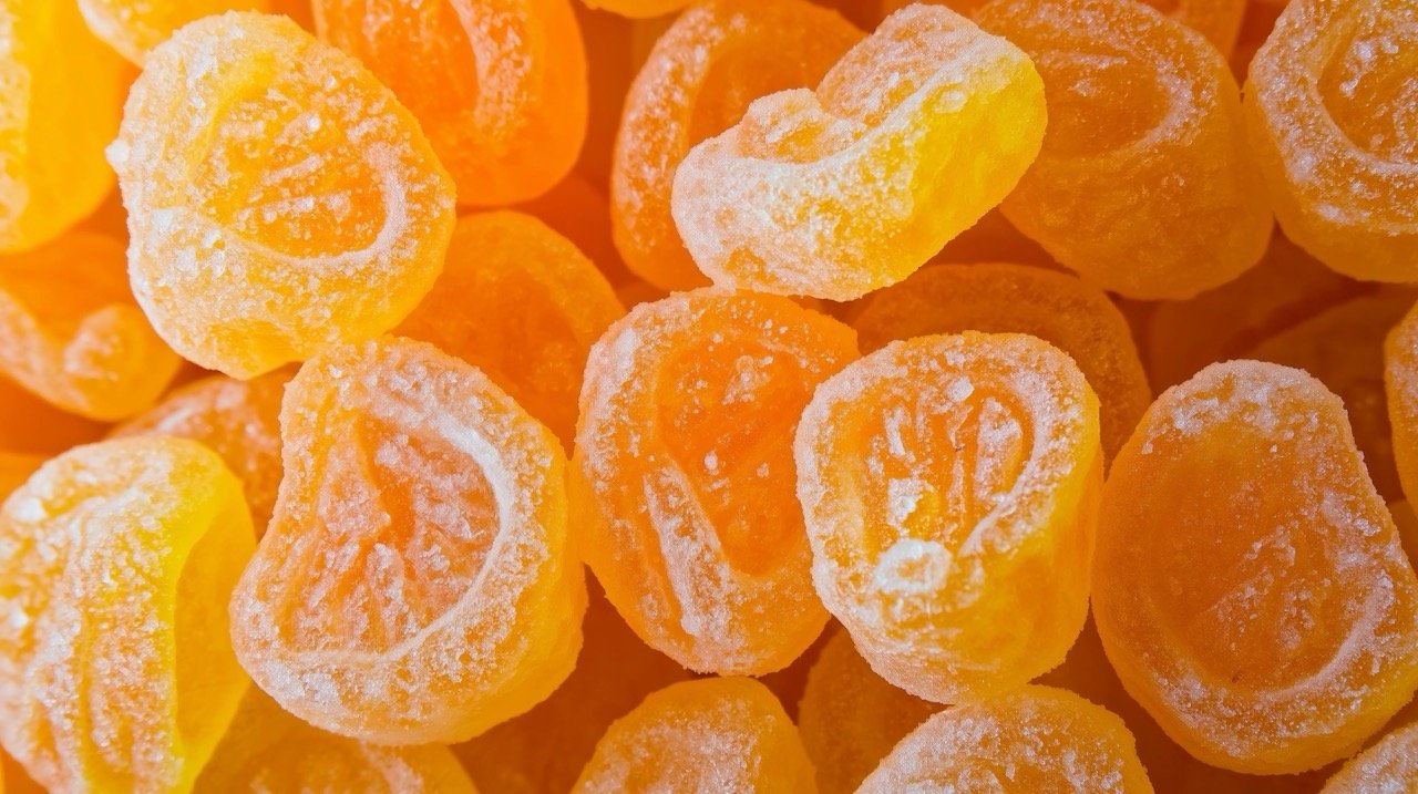 Orange Candy Sweet Treat – Colorful Orange Fruit Candy, Sugar Sweet Food, Vibrant Orange Color